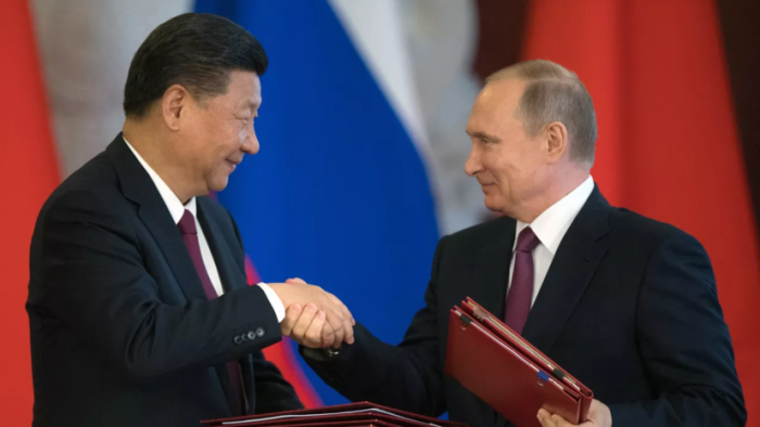 Vladimir Putin va Si Szinpin Rossiya va Xitoy munosabatlari haqida maqolalar yozgan