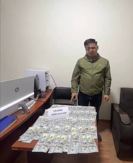 Андижон кадастр бошлиғи пора билан ушланди Андижон кадастр бошлиғи пора билан ушланди